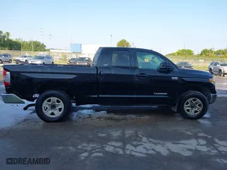 2014 Toyota Tundra 4WD Truck SR with VIN 5TFUW5F1XEX377799, listed as a IAAI auction lot 41889381 with 225,551 mi miles. Bid and sale history available at carsss.com. Image 13.