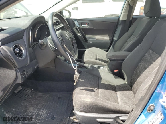 2018 Toyota Corolla iM with VIN JTNKARJE4JJ556372, listed as a Copart auction lot 53673265 with 122,909 mi miles and Salvage Title. Bid and sale history available at carsss.com. Image 7.