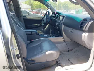 2004 Toyota 4Runner SR5 with VIN JTEBU14R448015129, listed as a IAAI auction lot 42040611 with 243,818 mi miles. Bid and sale history available at carsss.com. Image 5.