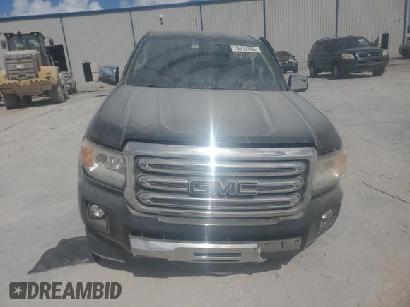 2015 GMC Canyon 2WD SLT with VIN 1GTG5CE31F1263234, listed as a Copart auction lot 76512794 with 113,180 mi miles and Salvage Title. Bid and sale history available at carsss.com. Image 5.