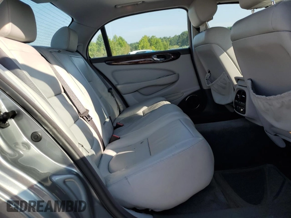 2005 Jaguar XJ with VIN SAJWA79C65SG45989, listed as a Copart auction lot 65357044 with 103,587 mi miles and Salvage Title. Bid and sale history available at carsss.com. Image 11.