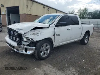 2018 Ram 1500 Big Horn with VIN 1C6RR7LT0JS329628, listed as a Copart auction lot 58234985 with 97,859 mi miles and Salvage title. Bid and sale history available at DreamBid. Image 1.