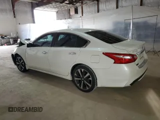 2016 Nissan Altima SR with VIN 1N4AL3AP7GC267854, listed as a Copart auction lot 49595595 with Not Provided miles and Salvage Title. Bid and sale history available at DreamBid. Image 2.