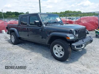 2022 Jeep Gladiator Texas Trail z VIN 1C6HJTAG8NL113611, wystawiony jako IAAI lot #42606904 z przebiegiem 50 819 mil mil oraz . Historia ofert i sprzedaży dostępna na DreamBid. Obrazek 1.