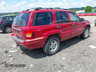 2004 Jeep Grand Cherokee Laredo z VIN 1J8GW48S24C400424, wystawiony jako IAAI lot #42215397 z przebiegiem 122 246 mil mil oraz . Historia ofert i sprzedaży dostępna na DreamBid. Obrazek 4.