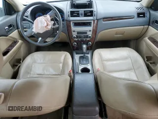2012 Ford Fusion SEL z VIN 3FAHP0JA3CR184074, wystawiony jako Copart lot #51973675 z przebiegiem 192 732 mil mil oraz Szkoda całkowita • Salvage title. Historia ofert i sprzedaży dostępna na DreamBid. Obrazek 8.