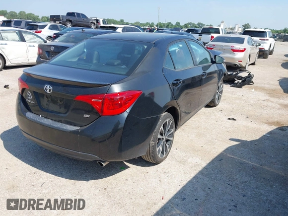 2017 Toyota Corolla L with VIN 5YFBURHE9HP731223, listed as a IAAI auction lot 42381802 with 86,954 mi miles and . Bid and sale history available at DreamBid. Image 4.