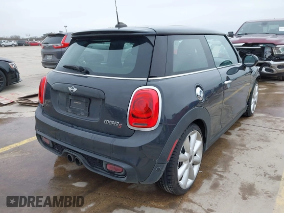 2014 MINI Hardtop S with VIN WMWXM7C56ET926604, listed as a IAAI auction lot 41642560 with 81,219 mi miles and . Bid and sale history available at DreamBid. Image 4.