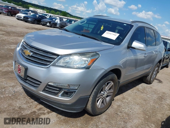 2015 Chevrolet Traverse LT with VIN 1GNKRHKD1FJ359123, listed as a IAAI auction lot 42247341 with 180,189 mi miles and . Bid and sale history available at DreamBid. Image 2.