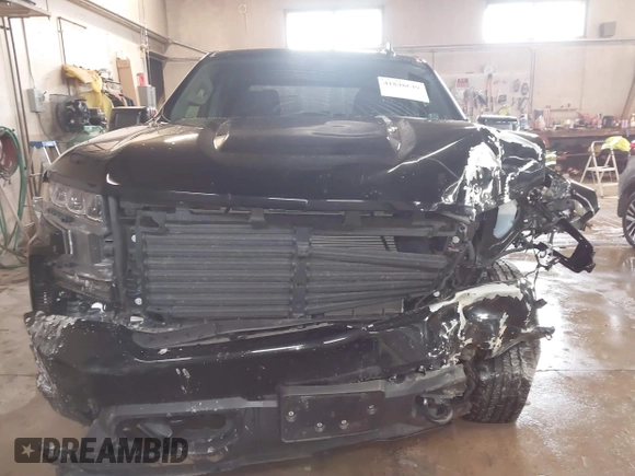 2019 Chevrolet Silverado 1500 RST with VIN 3GCUYEED9KG133843, listed as a IAAI auction lot 41848649 with 57,066 mi miles and . Bid and sale history available at DreamBid. Image 12.