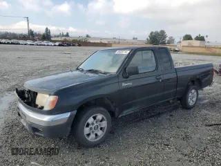 1999 Nissan Frontier XE with VIN 1N6DD26S6XC332458, listed as a Copart auction lot 48028715 with 182,706 mi miles and Salvage title. Bid and sale history available at DreamBid. Image 1.