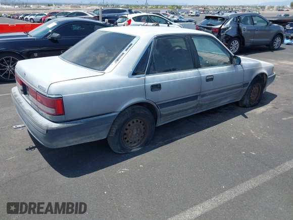 1988 Mazda 626 z VIN JM1GD2221J1550574, wystawiony jako IAAI lot #42415062 z przebiegiem 190 747 mil mil oraz . Historia ofert i sprzedaży dostępna na DreamBid. Obrazek 4.