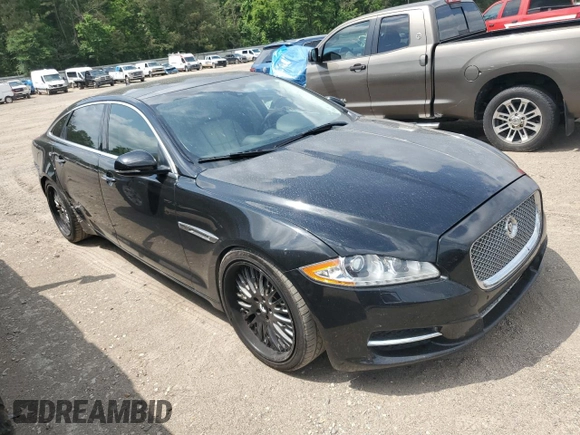 2015 Jaguar XJ with VIN SAJWA2GZXF8V88962, listed as a Copart auction lot 53919035 with 129,987 mi miles and Salvage Title. Bid and sale history available at carsss.com. Image 4.