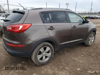 2013 Kia Sportage LX с VIN KNDPB3A28D7512869, выставлен на аукционе Copart как лот 87435794 с пробегом 92 717 миль миль и Чистый • Clean title. История ставок и продаж доступна на DreamBid. Изображение 3.