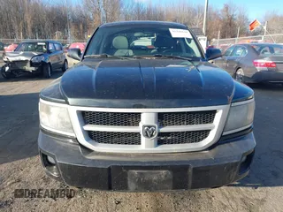 2011 Ram Dakota Bighorn/Lonestar with VIN 1D7RW3GK1BS636518, listed as a IAAI auction lot 41346644 with 155,125 mi miles. Bid and sale history available at carsss.com. Image 12.