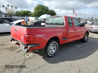 2003 Ford F-150 XL with VIN 1FTRX07213KB93777, listed as a Copart auction lot 46950285 with 176,332 mi miles and Salvage title. Bid and sale history available at DreamBid. Image 3.