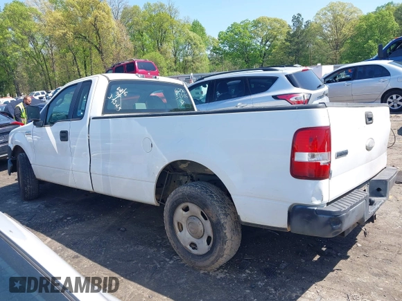 2007 Ford F-150 XL with VIN 1FTRF12257NA06206, listed as a IAAI auction lot 41973920 with 295,169 mi miles and . Bid and sale history available at DreamBid. Image 14.