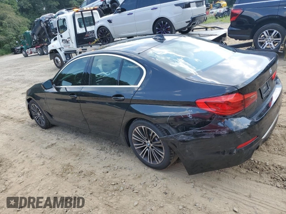 2020 BMW 5 Series with VIN WBAJB1C03LCD19170, listed as a Copart auction lot 64942594 with 66,584 mi miles and Salvage title. Bid and sale history available at DreamBid. Image 2.
