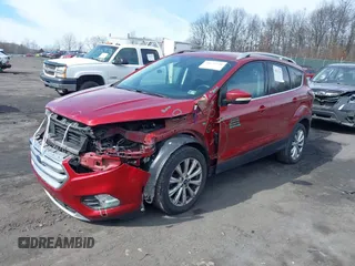 2017 Ford Escape Titanium with VIN 1FMCU0JD9HUC71738, listed as a IAAI auction lot 41673228 with 173,615 mi miles. Bid and sale history available at carsss.com. Image 17.