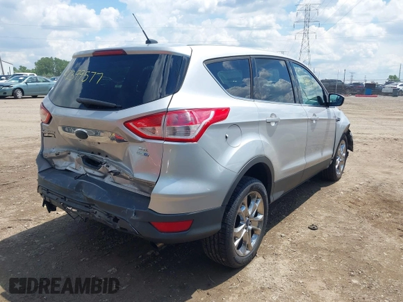 2013 Ford Escape SEL z VIN 1FMCU9H94DUD19842, wystawiony jako IAAI lot #42399577 z przebiegiem 176 257 mil mil oraz . Historia ofert i sprzedaży dostępna na DreamBid. Obrazek 4.
