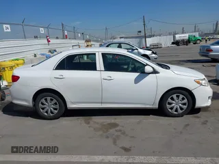 2010 Toyota Corolla with VIN 1NXBU4EE2AZ223753, listed as a IAAI auction lot 42024028 with 204,029 mi miles. Bid and sale history available at carsss.com. Image 13.