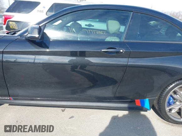 2015 BMW 2 Series M235i with VIN WBA1J7C55FV358964, listed as a IAAI auction lot 41674800 with 63,504 mi miles and . Bid and sale history available at carsss.com. Image 14.