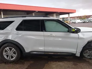 2022 Ford Explorer XLT z VIN 1FMSK7DH0NGB25926, wystawiony jako IAAI lot #42181595 z przebiegiem 15 063 mil mil oraz . Historia ofert i sprzedaży dostępna na DreamBid. Obrazek 13.