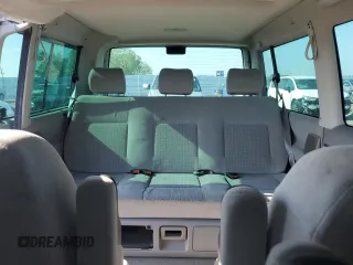 2000 Volkswagen EuroVan с VIN WV2MH4703YH013265, выставлен на аукционе Copart как лот 59003645 с пробегом Не указан миль и Списание • Salvage title. История ставок и продаж доступна на DreamBid. Изображение 10.