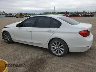 2013 BMW 3 Series 320i xDrive with VIN WBA3C3C51DF978651, listed as a Copart auction lot 58507915 with 117,025 mi miles and Salvage title. Bid and sale history available at DreamBid. Image 2.