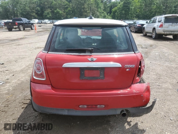 2013 MINI Hardtop with VIN WMWSU3C54DT687765, listed as a Copart auction lot 54677425 with Not Provided miles and Salvage Title. Bid and sale history available at DreamBid. Image 6.