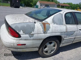 1998 Chevrolet Monte Carlo LS z VIN 2G1WW12MXW9114335, wystawiony jako IAAI lot #42284798 z przebiegiem 214 728 mil mil oraz . Historia ofert i sprzedaży dostępna na DreamBid. Obrazek 13.