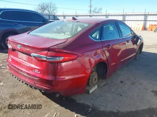 2019 Ford Fusion Hybrid SE with VIN 3FA6P0LU5KR189838, listed as a IAAI auction lot 41407401 with 134,834 mi miles. Bid and sale history available at carsss.com. Image 4.
