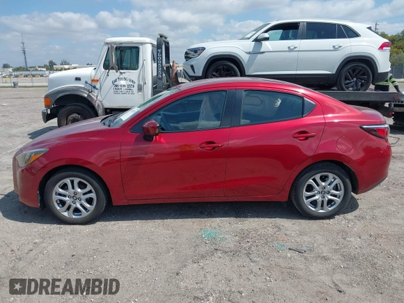 2018 Toyota Yaris with VIN 3MYDLBYV9JY318762, listed as a IAAI auction lot 42109728 with 72,931 mi miles and . Bid and sale history available at DreamBid. Image 14.