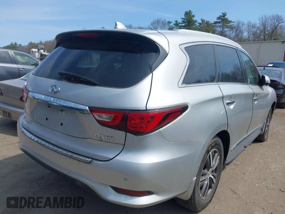 2017 Infiniti QX60 with VIN 5N1DL0MM8HC507403, listed as a IAAI auction lot 42079563 with 162,234 mi miles and . Bid and sale history available at DreamBid. Image 4.