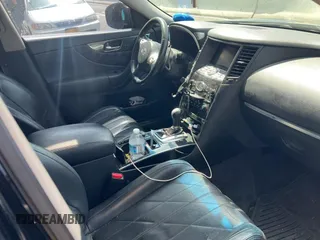 2009 Infiniti FX z VIN JNRAS18W59M157834, wystawiony jako Copart lot #55642965 z przebiegiem 165 571 mil mil oraz Tytuł czysty. Historia ofert i sprzedaży dostępna na DreamBid. Obrazek 5.