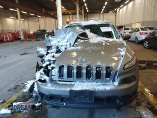 2015 Jeep Cherokee Latitude with VIN 1C4PJMCS5FW510298, listed as a IAAI auction lot 41518453 with 99,568 mi miles and . Bid and sale history available at DreamBid. Image 13.