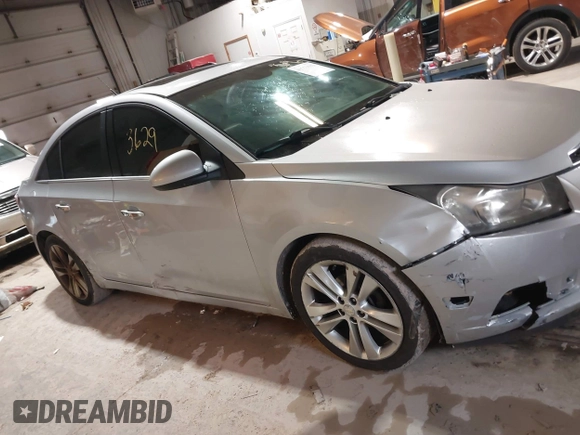2011 Chevrolet Cruze LTZ with VIN 1G1PH5S98B7144253, listed as a IAAI auction lot 41753692 with 208,873 mi miles and . Bid and sale history available at DreamBid. Image 13.
