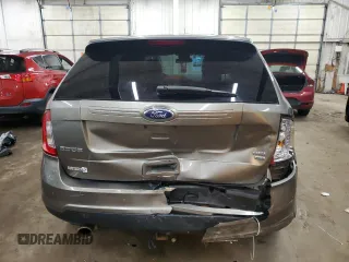 2014 Ford Edge SEL z VIN 2FMDK4JC2EBA50332, wystawiony jako Copart lot #87367284 z przebiegiem 164 873 mil mil oraz Szkoda całkowita • Salvage title. Historia ofert i sprzedaży dostępna na DreamBid. Obrazek 6.