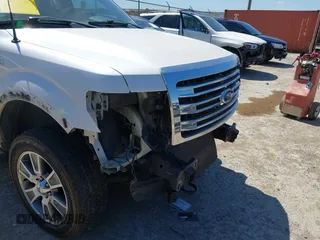 2014 Ford F-150 XL with VIN 1FTFW1EF4EKF03876, listed as a IAAI auction lot 41871706 with 151,642 mi miles. Bid and sale history available at carsss.com. Image 6.