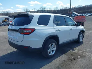 2023 Honda Pilot LX with VIN 5FNYG2H29PB007041, listed as a IAAI auction lot 41887999 with 8,107 mi miles. Bid and sale history available at carsss.com. Image 4.