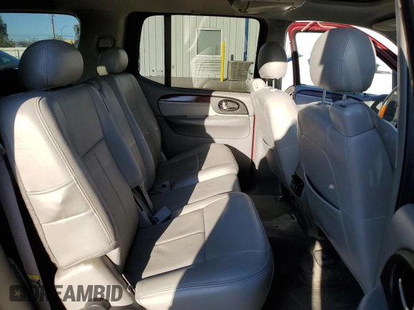 2006 GMC Envoy Denali z VIN 1GKES66M766163803, wystawiony jako Copart lot #75289784 z przebiegiem 194 386 mil mil oraz Szkoda całkowita • Salvage title. Historia ofert i sprzedaży dostępna na DreamBid. Obrazek 11.