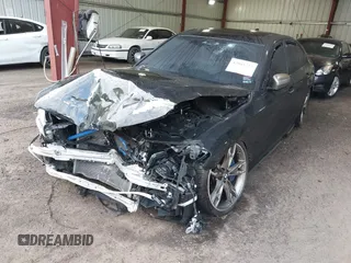2018 BMW 5 Series M550i xDrive with VIN WBAJB9C51JB035949, listed as a IAAI auction lot 42085727 with Not provided miles and . Bid and sale history available at DreamBid. Image 2.