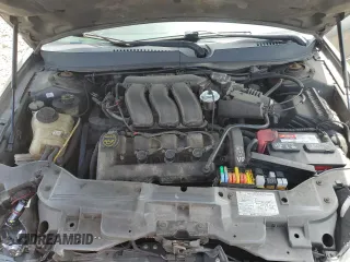 2005 Mercury Sable LS z VIN 1MEFM55S75A619345, wystawiony jako Copart lot #55858325 z przebiegiem Nie podano mil oraz Szkoda całkowita • Salvage title. Historia ofert i sprzedaży dostępna na DreamBid. Obrazek 11.