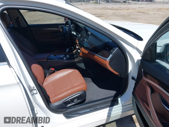 2015 BMW 5 Series 528i xDrive with VIN WBA5A7C54FG143565, listed as a IAAI auction lot 41948957 with 107,255 mi miles and . Bid and sale history available at carsss.com. Image 5.