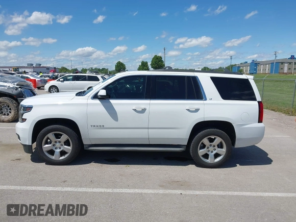 2015 Chevrolet Tahoe LT with VIN 1GNSKBKC8FR194164, listed as a IAAI auction lot 42315215 with 211,797 mi miles and . Bid and sale history available at DreamBid. Image 14.