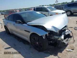 2014 Jaguar XJ z VIN SAJWA1CZXE8V59430, wystawiony jako IAAI lot #42252069 z przebiegiem 87 150 mil mil oraz . Historia ofert i sprzedaży dostępna na DreamBid. Obrazek 1.