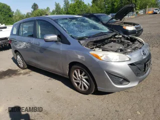 2014 Mazda 5 Sport with VIN JM1CW2BLXE0168024, listed as a Copart auction lot 55010995 with 204,562 mi miles and Salvage title. Bid and sale history available at DreamBid. Image 4.