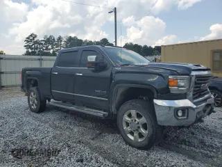 2017 GMC Sierra 2500HD SLT with VIN 1GT12TEY4HF138132, listed as a Copart auction lot 64664344 with 265,380 mi miles and Salvage Title. Bid and sale history available at carsss.com. Image 4.
