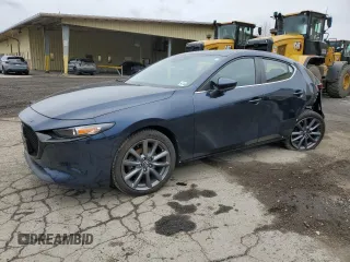 2021 Mazda 3 Preferred with VIN JM1BPBLL1M1340795, listed as a Copart auction lot 52627905 with 13,596 mi miles and Salvage title. Bid and sale history available at DreamBid. Image 1.