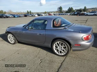 2002 Mazda MX-5 Miata Cloth with VIN JM1NB353X20228420, listed as a Copart auction lot 47949235 with 94,341 mi miles and Salvage title. Bid and sale history available at DreamBid. Image 2.